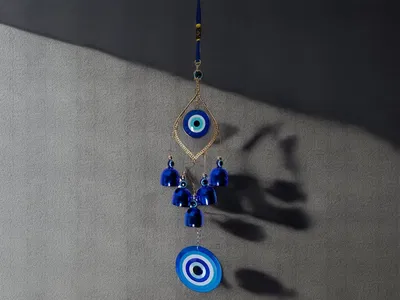 Llamador Ojo turco rayos 5 campanas 30 cm