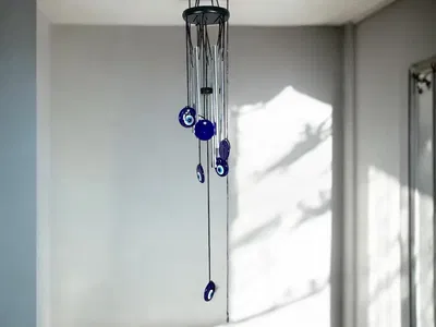 Llamador ojo turco metal y madera 25 cm