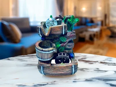 Fuente de agua con esfera y motor