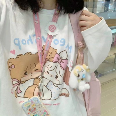 Remera meowshop larga oversized 