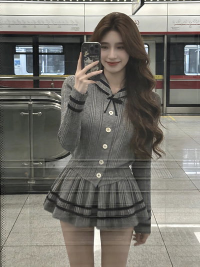 conjunto 2 piezas buzo cardigan + falda tableada de punto 