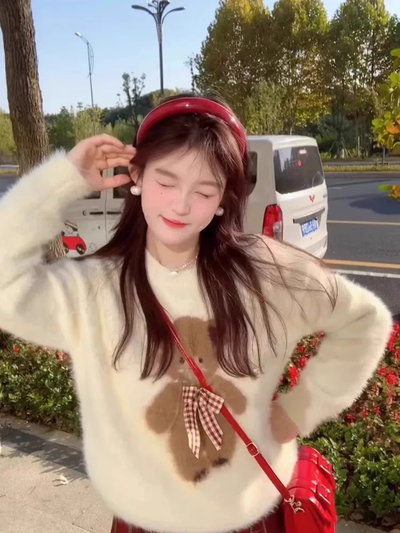 Buzo peluche osito con moño 