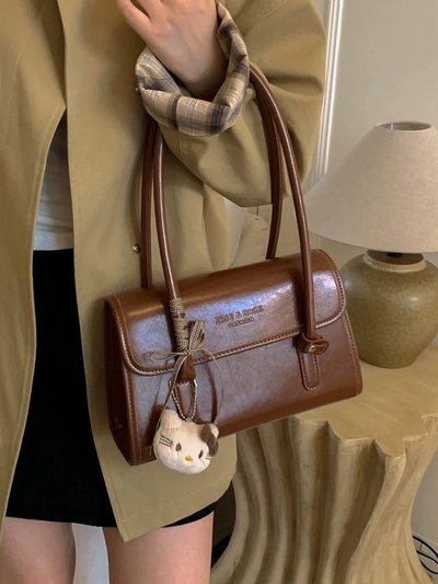 Bolso de hombro con charms