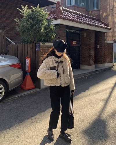 Campera corderito con cuerina 