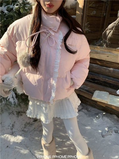 Campera rosa con moños y encaje 