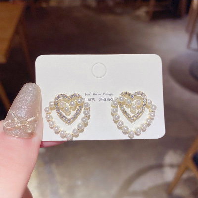 Aretes corazones enlazados