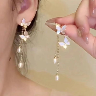 Arete mariposas blancas 