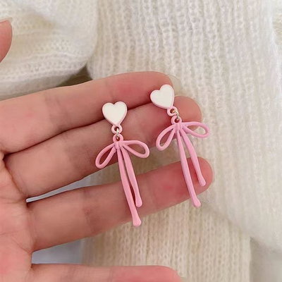 Aretes corazón y lazo largo 
