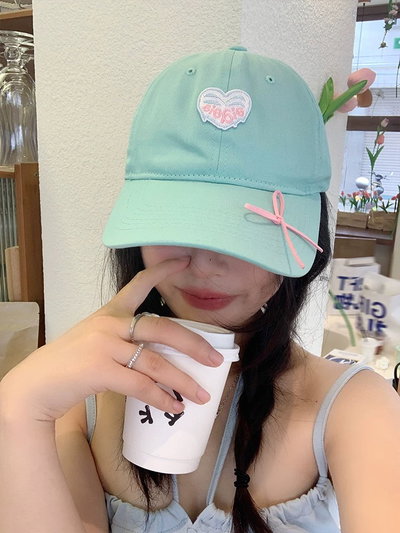 Gorra pastel con lazo 