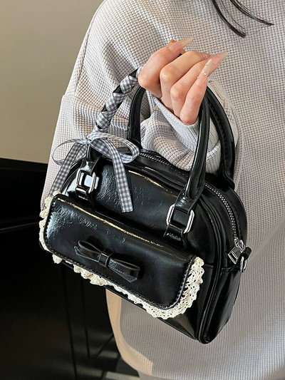 Bolso mini con volados y cinta 