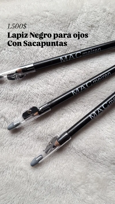 Lapiz grande negro de ojos con sacapuntas