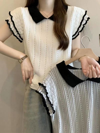 Blusa blanca y detalles negros 