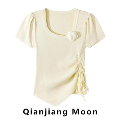 Blusa crema con flor