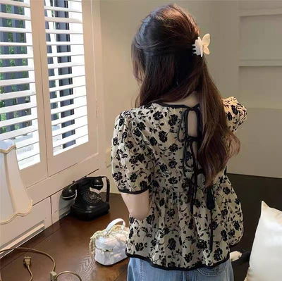 Blusa con flores 