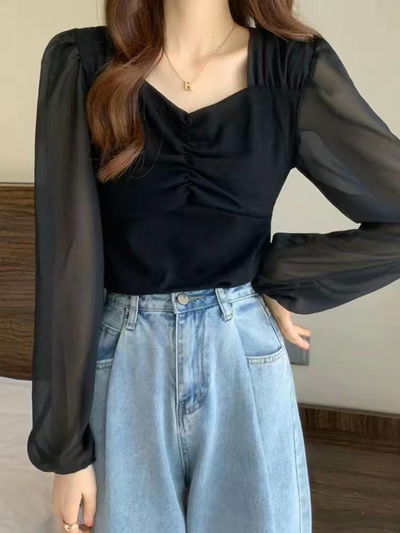 blusa negra fina