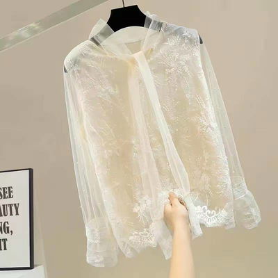 Blusa transparente crema