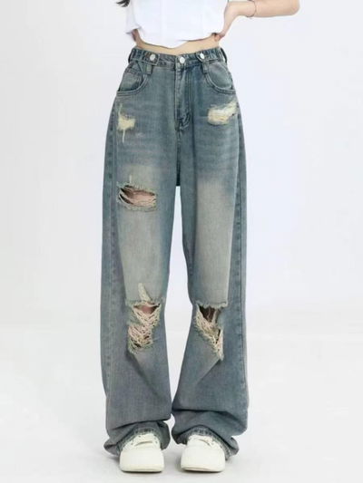 Jean ancho con agujeros talle M