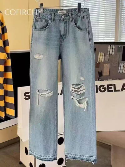 Jean ancho con agujeros talle M