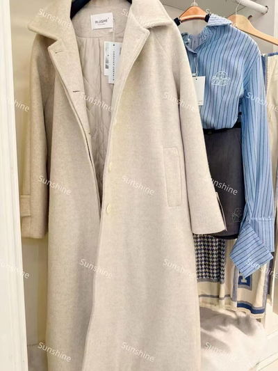 Abrigo de lana beige largo