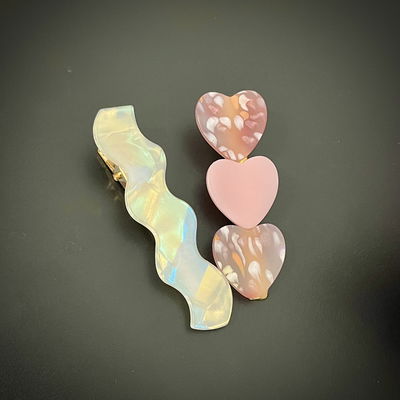 Hebilla tornasol ondas/corazón