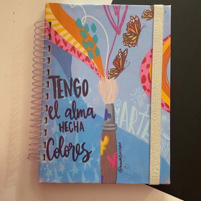 Cuaderno A5/100 hojas lisas con Elastico