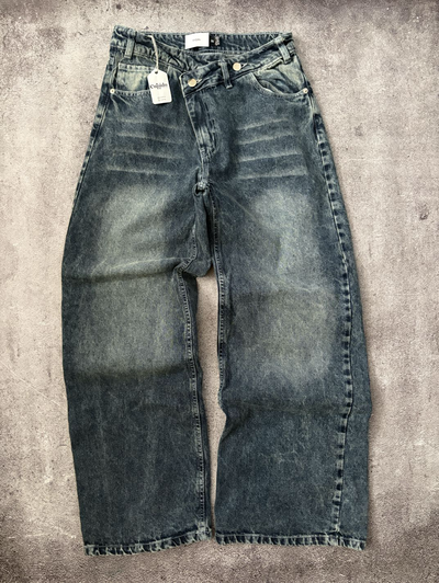 Jean Baggy Cintura Asimétrica C/2 Botones Tiro Medio