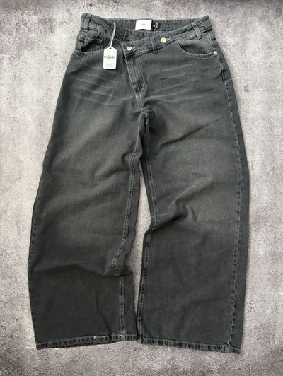 Jean Baggy Cintura Asimétrica C/2 Botones Tiro Medio