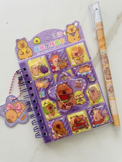 LIBRETA CAPIBARA GLITTER CON STICKERS