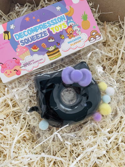 SCUISHY PERSONAJES HELLO KITTY GLITTER