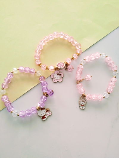 PULSERA ARCOIRIS CON DIJE COLGANTE SURTIDO