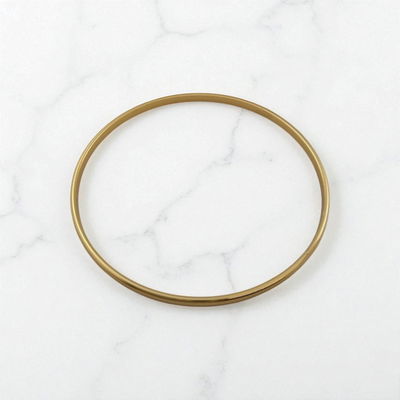 Esclava 65 mm x 3 mm Acero Dorado - 500028