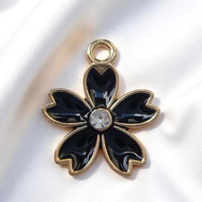 Dije Esmaltado Flor Negro Strass Acero Dorado - 400114NEG