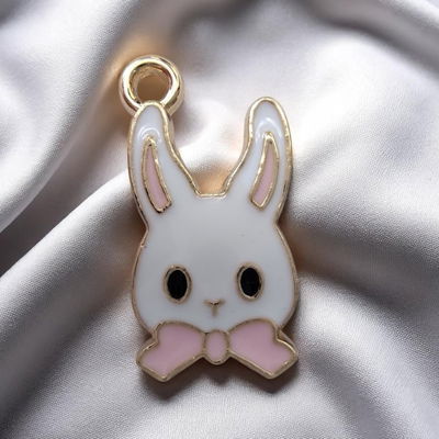 Dije Esmaltado Conejo Blanco Moño Rosa Acero Dorado - 400107