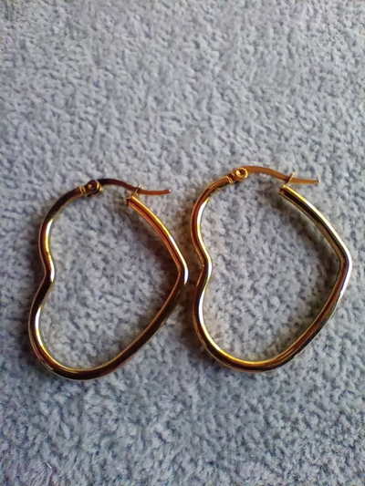 ARGOLLAS DE ACERO DORADO