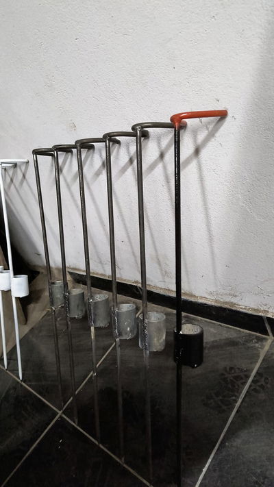 Posa cañas de hierro