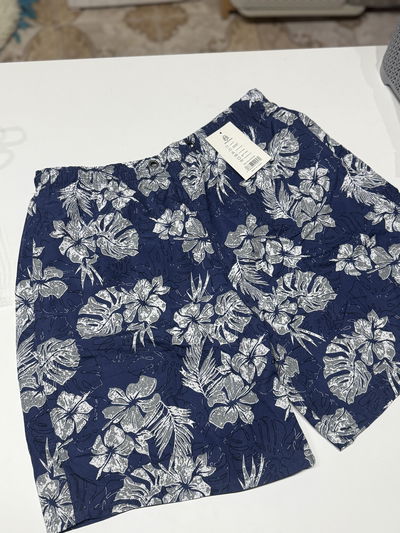Short malla hombre flores
