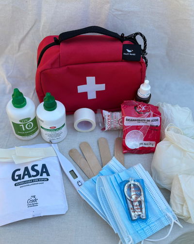 Botiquin con insumos + Mini pocket