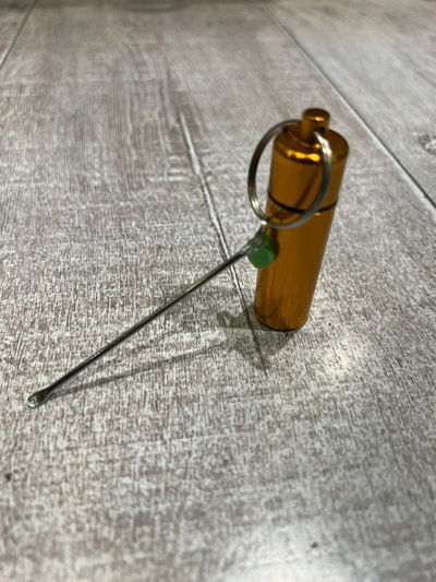 Frasco metal con palita