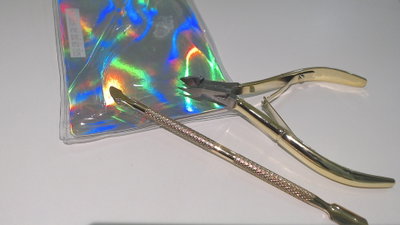Kit corta cutículas + repujador