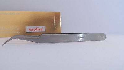 Pinza curva para pestañas