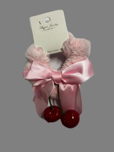 Colita con peluche y cereza 