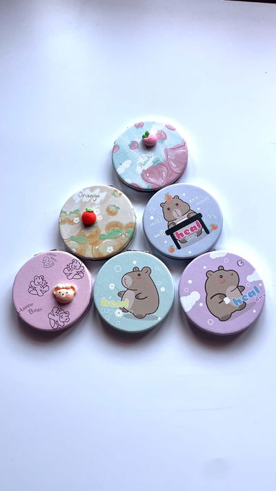 Espejo con aumento de mano