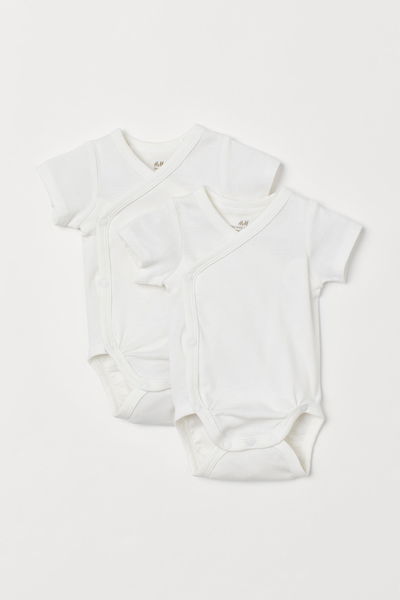 👶🏻🌼 Body H&M "Primer Suspiro" cruzado – blanco puro