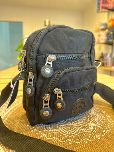 Bolsito mini morral tela de avion 