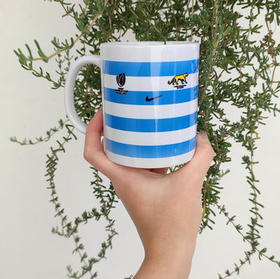 Taza de cerámica con diseño camiseta de llos pumas