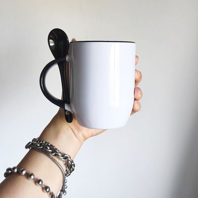 Taza bombe interior y cuchara en negro personalizado sublimado