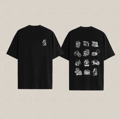 Remera negra con diseño de cámaras de algodón premium estampado dtf