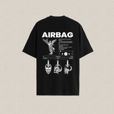 Remera negra con diseño airbag "al parecer todo..." de algodón premium estampado dtf