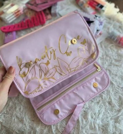 Neceser  rosa, con gancho para colgar 