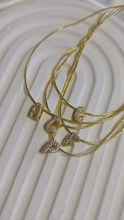 Collar aguja con inicial de Zirconias